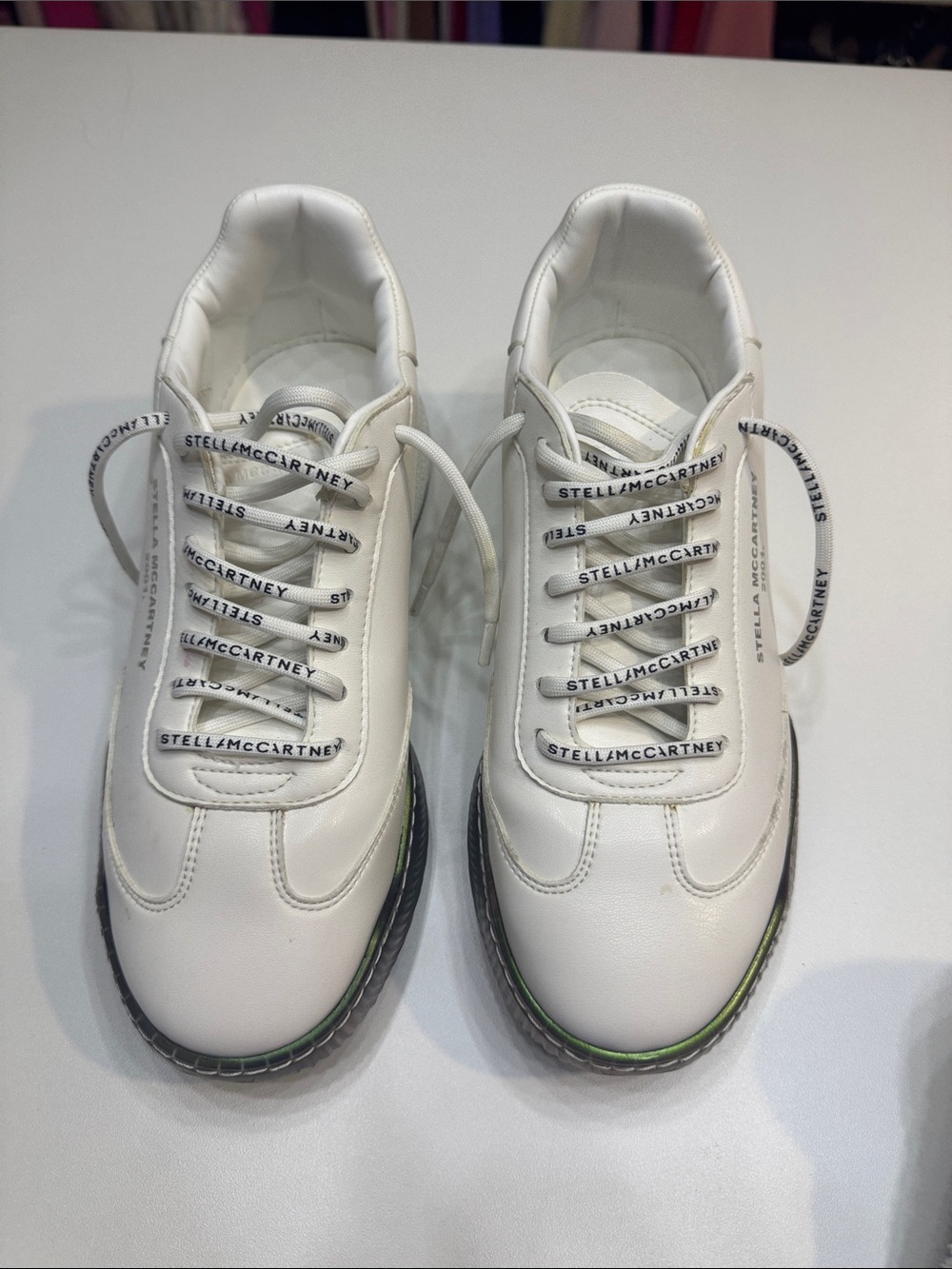 Stella McCartney White Sneakers with Black Logo Laces and Green Accent
